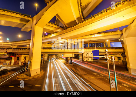 beautiful city interchange overpass at nightfall in shanghai Stock Photo