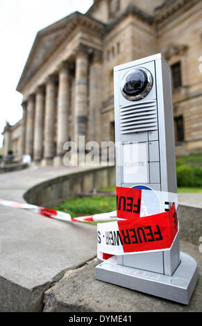 Red-white barrier tape of the fire brigade hangs on front of the Federal Administrative Court of Germany (BVerwG) in Leipzig, Germany, 22 April 2014. A suspicious white powder has triggered a fire brigade operation. The powder was found when a letter was opened in the court's mail room. No one was injured and the building was not evacuated. Photo: JAN WOITAS/DPA Stock Photo