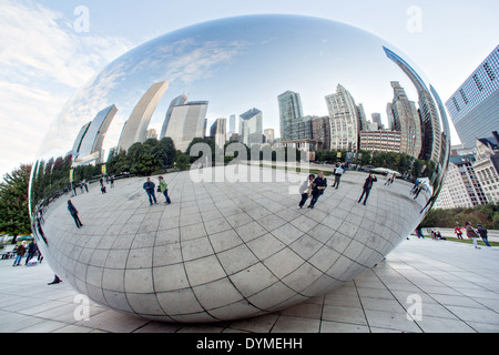 Cloud Gate Sculpture or The Bean with downtown skyline reflected in polished surface Millennium Park in Chicago, Illinois Stock Photo