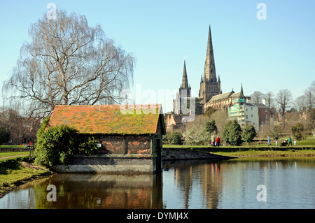 The boathouse alongside Stowe Pool with the Cathedral to the rear, Lichfield, Staffordshire, England, UK, Western Europe. Stock Photo