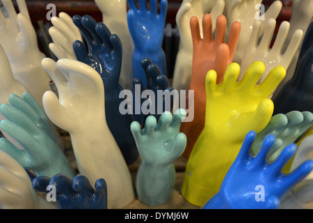 https://l450v.alamy.com/450v/dymj6w/a-display-of-hand-shaped-ceramic-jewelry-holders-at-the-fishs-eddy-dymj6w.jpg