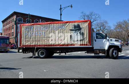 Mitzvah Tanks parading past Lubavitch headquarter to celebrate the birthday of the Lubavitcher Rebbe Menachem Mendel Schneerson. Stock Photo