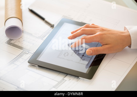 Close-up Of Hands Architect Woman Using Tablet Pc Stock Photo