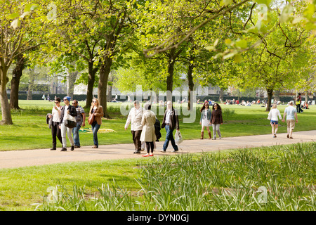 People walking  in Green Park in spring, London SW1 UK Stock Photo