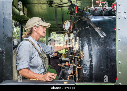 Female locomotive engineers, steam locomotive, before train departure at Fort Steele Heritage Town, British Columbia, Canada Stock Photo