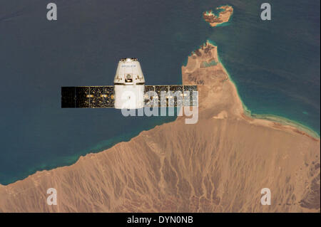 SpaceX CRS-3 Dragon spacecraft carrying supplies for Expedition 39 crew members approaches the International Space Station for capture and berthing as it orbits above Yemen the Gulf of Aden and the Red Sea April 20, 2014 in Earth orbit. Stock Photo