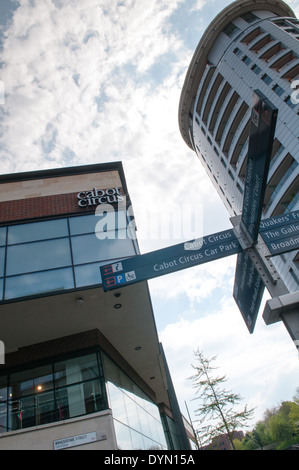 Pedestrian signs and towering stores in the Cabot Circus shopping mall in Bristol Stock Photo