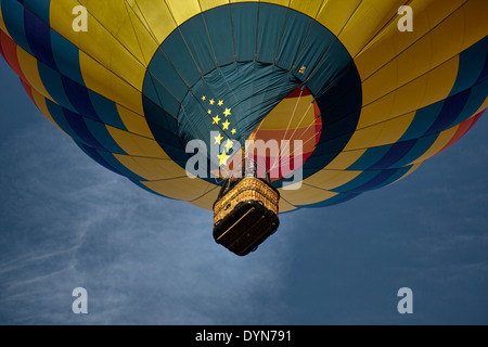 Hot air balloon rising from the desert Stock Photo