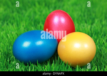Colorful Easter eggs on a green meadow Stock Photo