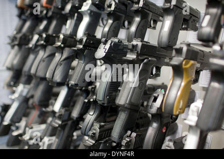 Rampe, Germany. 10th Apr, 2014. Handguns are pictured at the armoury of the State Criminal Police Office (LKA) of Mecklenburg-Western Pomerania in Rampe, Germany, 10 April 2014. According to the current arms report of the German state Mecklenburg-Western Pomerania more than 21,000 citizens had a firearms license at the end of 2013. There are currently almost 80,000 guns, rifles, pistols and revolvers stored in private safes in the north-east of Germany. Photo: Jens Buettner /ZB/dpa/Alamy Live News Stock Photo