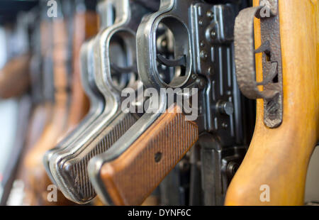 Rampe, Germany. 10th Apr, 2014. Assault rifles from WWII are pictured at the armoury of the State Criminal Police Office (LKA) of Mecklenburg-Western Pomerania in Rampe, Germany, 10 April 2014. According to the current arms report of the German state Mecklenburg-Western Pomerania more than 21,000 citizens had a firearms license at the end of 2013. There are currently almost 80,000 guns, rifles, pistols and revolvers stored in private safes in the north-east of Germany. Photo: Jens Buettner /ZB/dpa/Alamy Live News Stock Photo