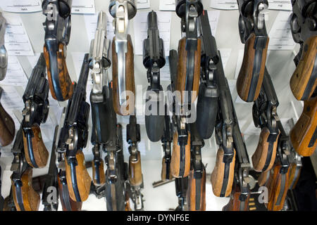 Rampe, Germany. 10th Apr, 2014. Revolvers are pictured at the armoury of the State Criminal Police Office (LKA) of Mecklenburg-Western Pomerania in Rampe, Germany, 10 April 2014. According to the current arms report of the German state Mecklenburg-Western Pomerania more than 21,000 citizens had a firearms license at the end of 2013. There are currently almost 80,000 guns, rifles, pistols and revolvers stored in private safes in the north-east of Germany. Photo: Jens Buettner /ZB/dpa/Alamy Live News Stock Photo