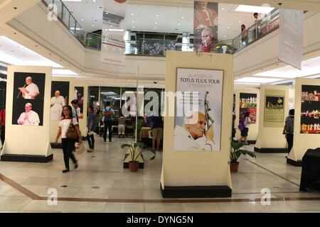 Manila, Philippines -The public exhibition and veneration of the relics and the photo reproduction of Blessed John Paul II  at the activity area of Gateway Mall in Araneta Center, Cubao Quezon City. The canonization of Blessed John Paul II will be on Sunday 27th of April 2014 in Vatican City. (Photo by Gregorio B. Dantes Jr. / Pacific Press) Stock Photo