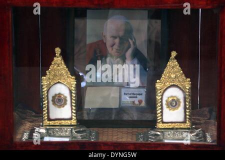 Manila, Philippines - The relics of Blessed John Paul II was exhibited at the activity area of Gateway Mall in Araneta Center, Cubao Quezon City. The relics on left is the hair strand of Blessed John Paul II and on right is the blood stain of Blessed John Paul II. The canonization of Blessed John Paul II will be on Sunday 27th of April 2014 in Vatican City. (Photo by Gregorio B. Dantes Jr. / Pacific Press) Stock Photo