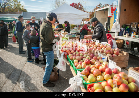 People buying apples at the Waverly Farmers Market in Baltimore, Maryland Stock Photo