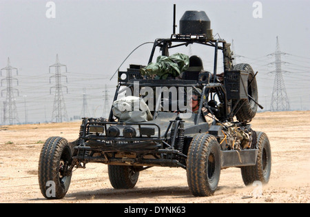 US Navy Sea-Air-Land SEAL team commandos check their Desert Patrol Vehicles before an upcoming mission February 13, 2002 in Camp Doha, Kuwait. Stock Photo