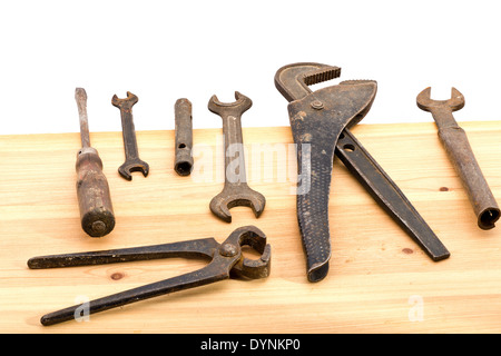 old used tools on the wooden desk Stock Photo
