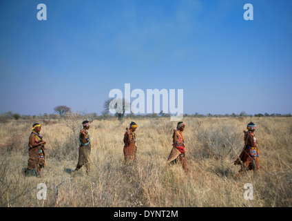 Line Of Bushman Hunters, Tsumkwe, Namibia Stock Photo