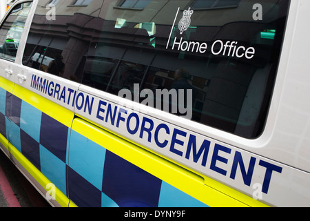 Home Office Immigration Enforcement van driving through South London, UK.