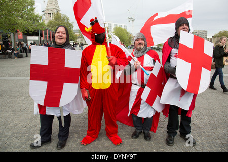 Men dressed up as Saint George on St George's Day. London, UK. Stock Photo