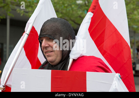 Men dressed up as Saint George on St George's Day. London, UK. Stock Photo