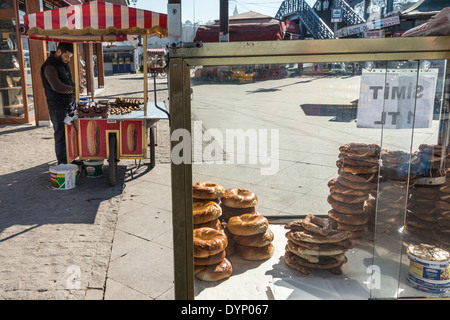 Simit bread for sale on the quay at Eminonu by Galata bridge, Istanbul, Turkey. Stock Photo