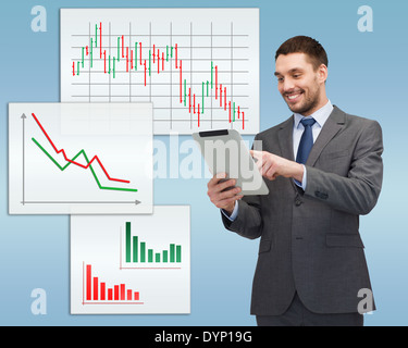smiling buisnessman with tablet pc computer Stock Photo