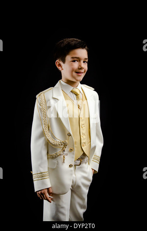 A young boy celebrating his First Holy Communion Stock Photo