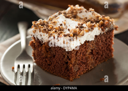 Homemade Toffee and Chocolate Cake with Vanilla Frosting Stock Photo