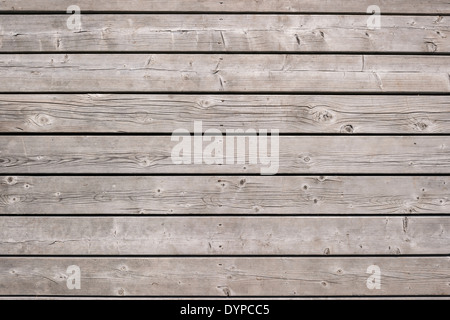 Background of old wooden weathered unpainted deck planks Stock Photo