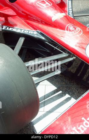 USA, Indiana, Indianapolis. Close-up view of front tire and steering mechanism of red Honda Indycar Stock Photo