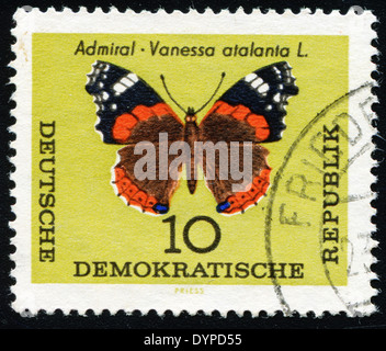 DDR - CIRCA 1964: A stamp printed in DDR, shows a butterfly Vanessa atalanta, circa 1964 Stock Photo