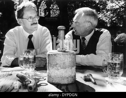 Lord mayor of Munich Christian Ude and Georg Kronawitter in the beer garden, 1993 Stock Photo