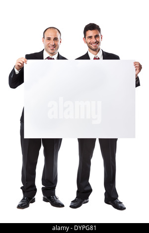 Two Businessmen standing on a white background holding a billboard Stock Photo