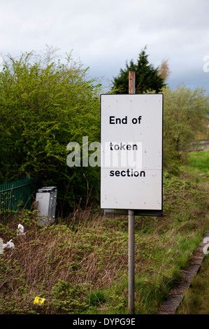 Sign indicating the end of a section of single track railway on the Heart of Wales line at LLandrindod Stock Photo