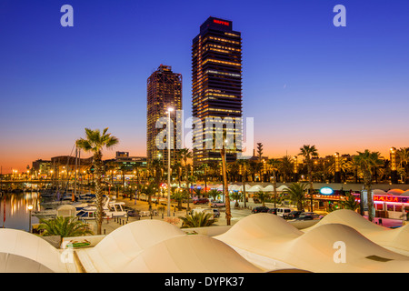 Sunset view over Port Olimpic with Hotel Arts and Mapfre Tower in the background, Barcelona, Catalonia, Spain Stock Photo