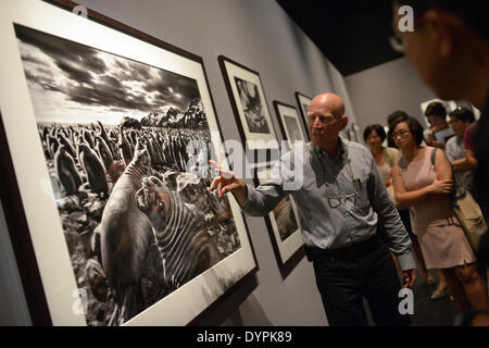 Singapore. 24th Apr, 2014. Brazilian photographer Sebastiao Salgado speaks at a media preview of his exhibition of 'Genesis' at the Singapore's National Museum in Singapore, April 24, 2014. The exhibition will open to the public at the Singapore's National Museum from April 26 to July 27. Credit:  Then Chih Wey/Xinhua/Alamy Live News Stock Photo