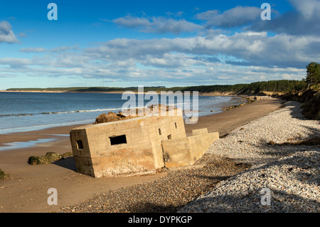 WORLD WAR II PILL BOXES ON THE SAND OF FINDHORN BEACH MORAY SCOTLAND Stock Photo