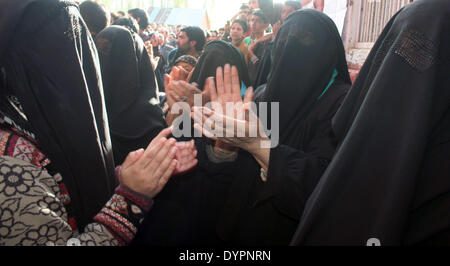 Srinagar, Indian Administered Kashmir. 24  APRIL2014 : kashmiri womens supporters  charing   Peoples Democratic Party president mehbooba mufti daughter of mufti mohammad syed   (P D P) cast vote at  polling both ahead of first phase lok sabah election at south kashmiris anatnag District  (Sofi Suhail/Alamy Live News ) Stock Photo