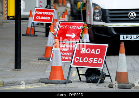 London, England, UK. Collection of traffic signs by roadworks - road closed / footpath closed / pedestrian diversion Stock Photo