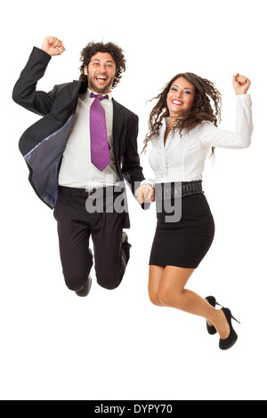 An handsome businessman and a gorgeous businesswoman jumping over a white background Stock Photo