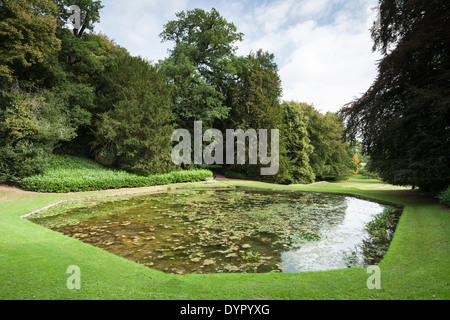 A slightly elevated view of the large ornamental octagonal pond in Venus' Vale, Rousham House gardens, Oxfordshire, England Stock Photo