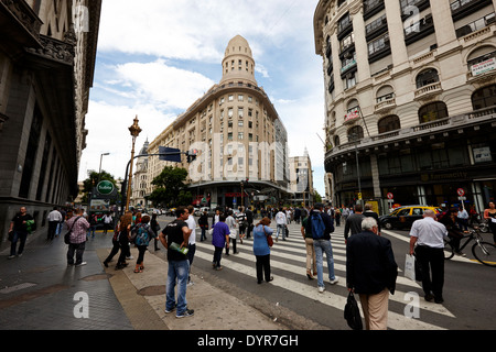 people crossing calle florida Edificio Bencich and south end of florida street downtown Buenos Aires Argentina Stock Photo