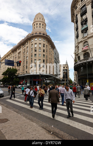 people crossing calle florida Edificio Bencich and south end of florida street downtown Buenos Aires Argentina Stock Photo