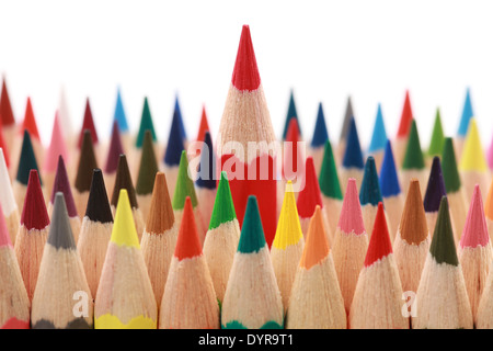 Business concepts: red crayon standing out from the crowd