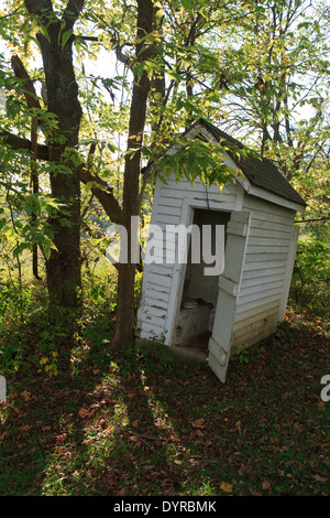 Old outhouse in near ruins. Stock Photo