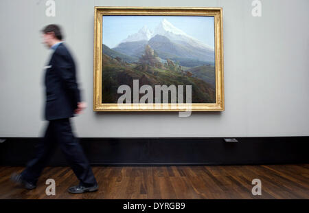 Berlin, Germany. 24th Apr, 2014. A man walks past a painting 'The Watzmann' (1824/25) by Caspar David Friedrich in the Alte Nationalgalerie in Berlin, Germany, 24 April 2014. The Gurlitt case has rekindled the debate around artwork stolen by the Nazis. German museums are coming under more scrutiny. Photo: DANIEL NAUPOLD/dpa/Alamy Live News Stock Photo