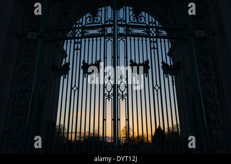 Sunset through the gates of the War Memorial at Victoria Embankment, Nottingham Nottinghamshire England UK Stock Photo