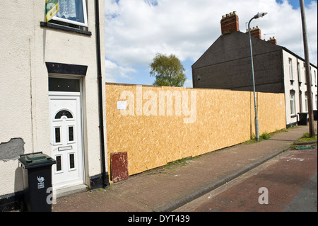 Boarded wasteland waiting housing development Newport South Wales UK Stock Photo