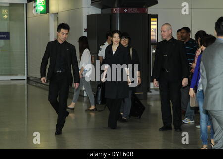 Hong Kong, China. 24th Apr, 2014. South Korean actress Lee Young Ae arrives in Hong Kong with 8 security guards around and looks tired in Hong Kong, China on Thursday April 24, 2014. © TopPhoto/Alamy Live News Stock Photo